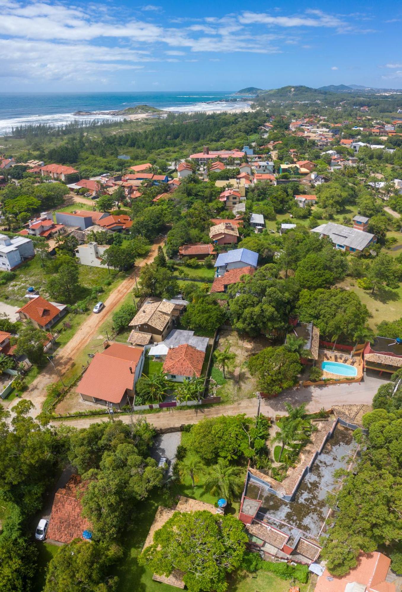 Отель Pousada Beleza Pura Na Praia Da Ferrugem Гаропаба Экстерьер фото